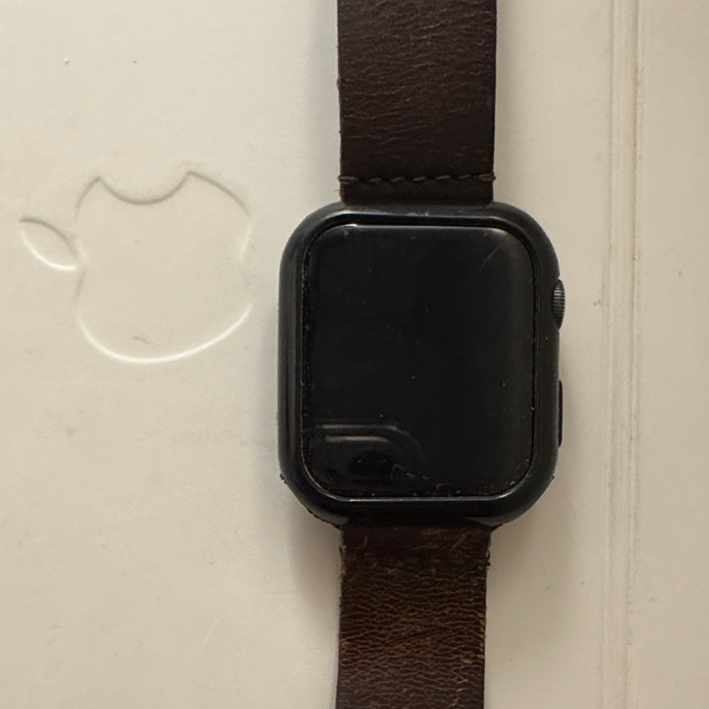 Apple Smartwatch series 6 44mm with Brown leather band.